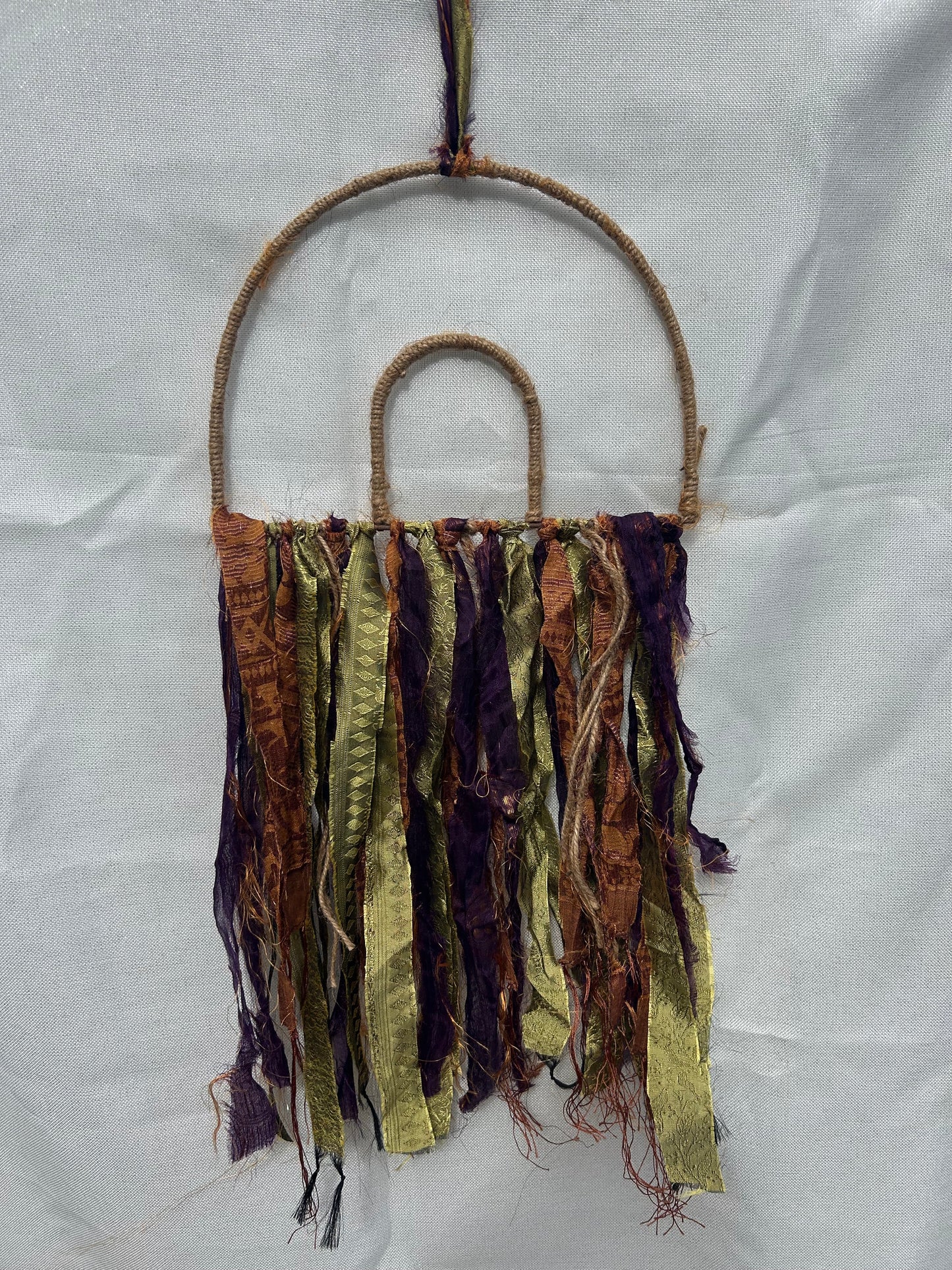 Earthy rainbow wall hanging