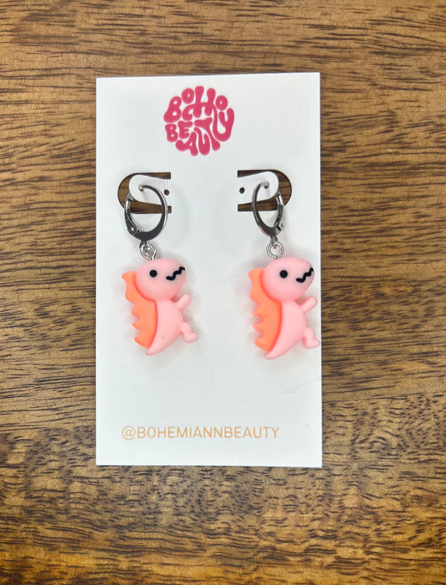 Playful dinosaur charm earrings